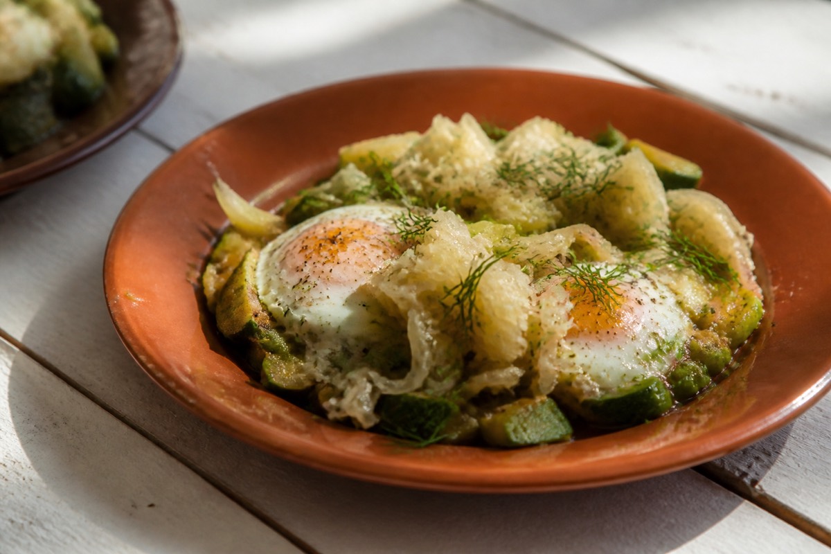 Sauerkraut-topped green baked eggs