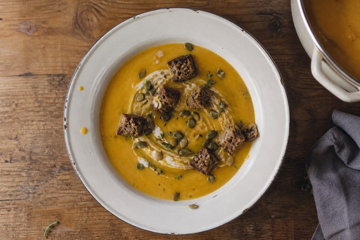 Roast garlic & squash soup with seedy croutons